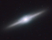 Star cluster surrounds wayward black hole in cannibal galaxy ESO 243-49 (labelled)