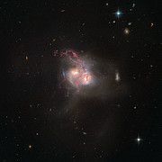 An ongoing cosmic collision