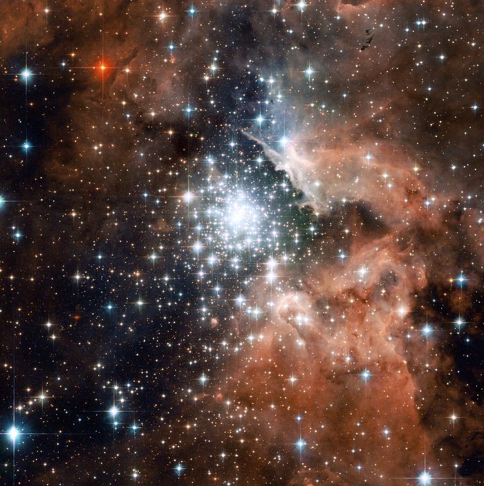Extreme star cluster bursts into life in new Hubble image