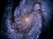 This comparison image of the core of the galaxy M100 shows the dramatic improvement in Hubble Space Telescope's view of the universe.
