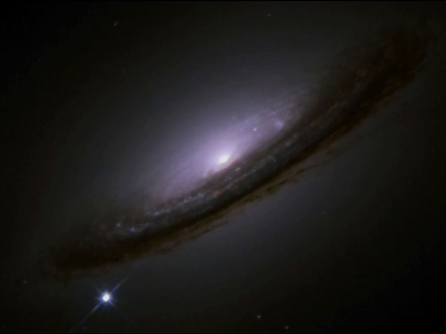 Ground-based image compared to Hubble image